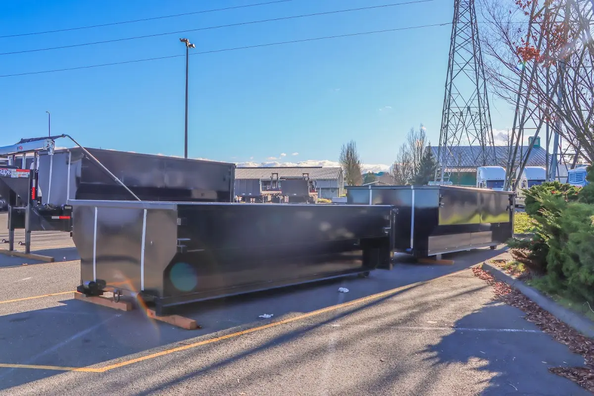 Roll-off dumpster ready for waste disposal at job site for 4 Yard Dumpster Rental in Thompson